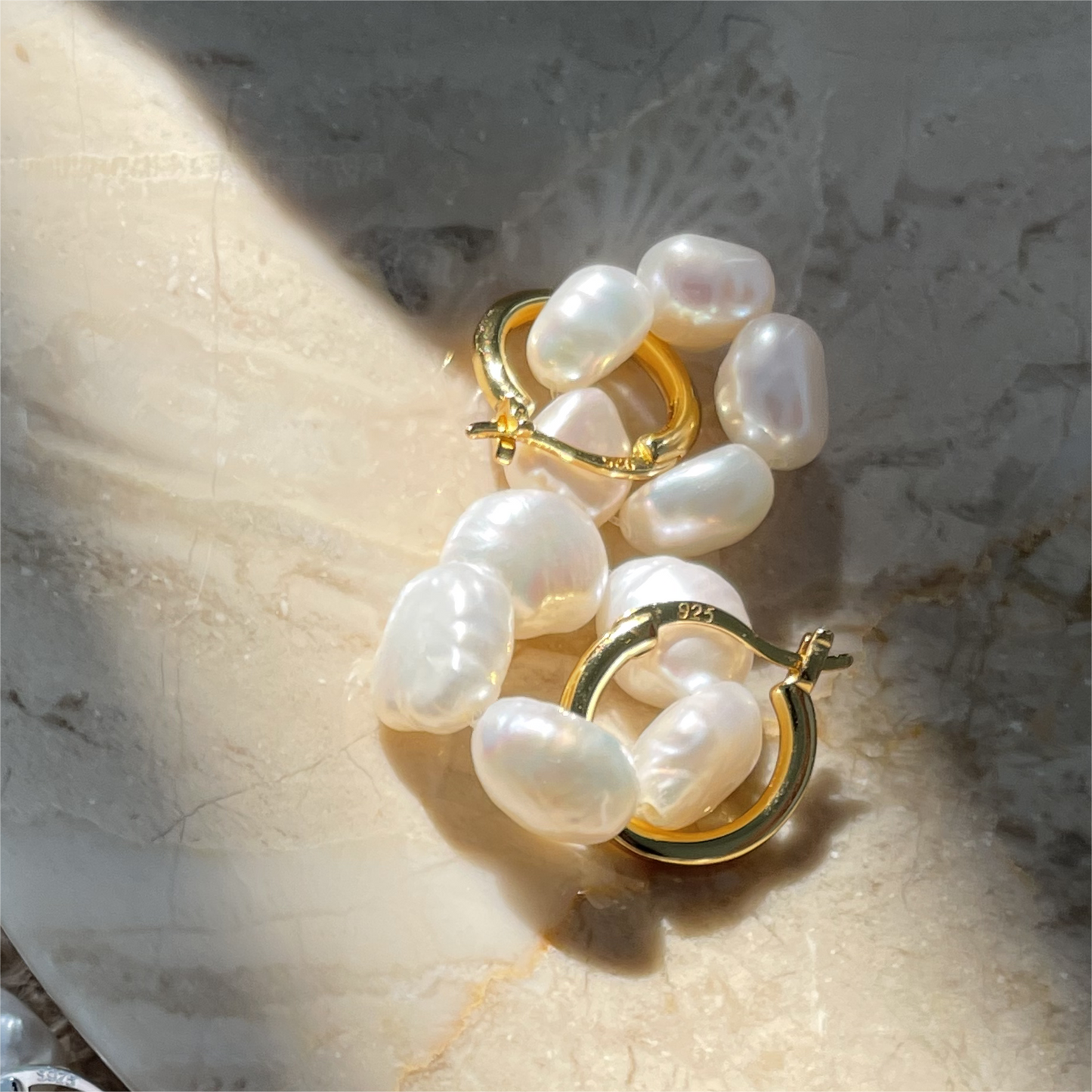 Earrings in the shape of natural freshwater pearl flowers