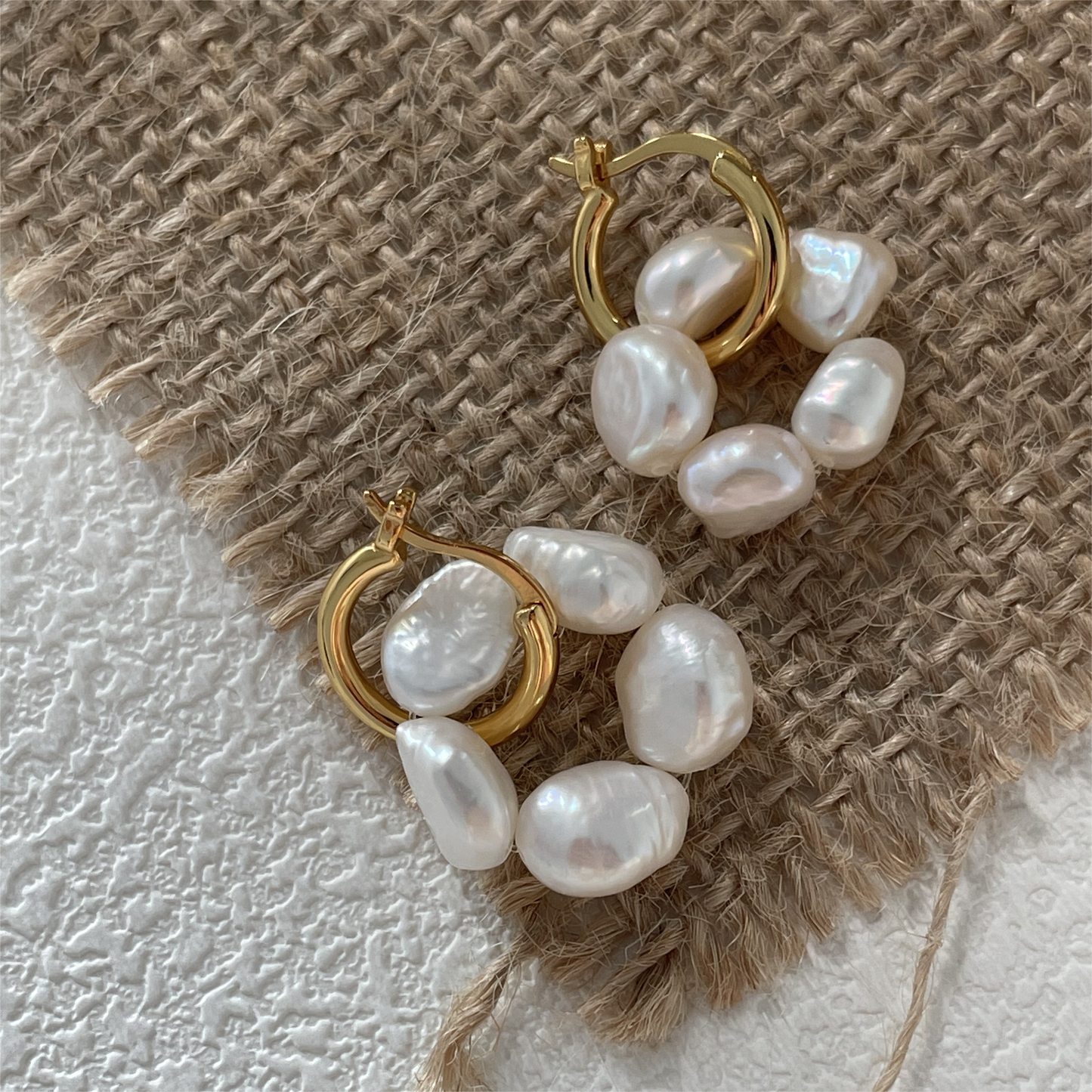 Earrings in the shape of natural freshwater pearl flowers