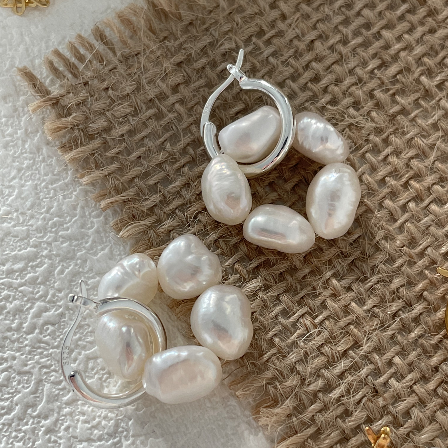 Earrings in the shape of natural freshwater pearl flowers